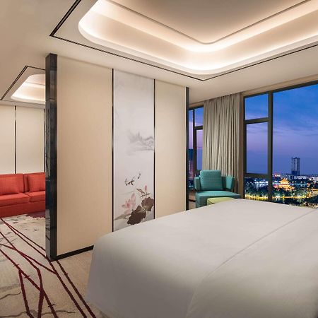 Ramada By Wyndham Mengzi Suites Eksteriør bilde