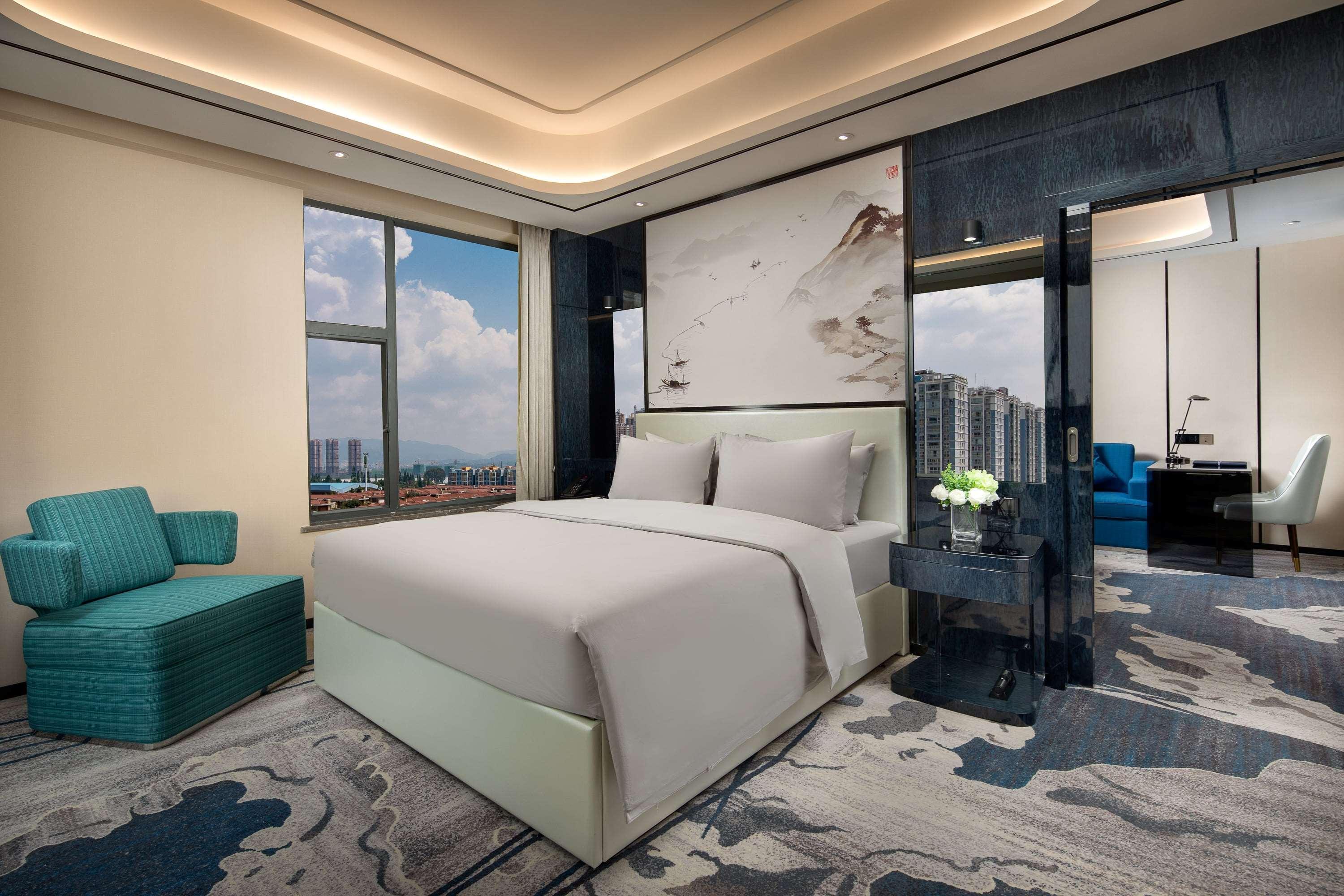 Ramada By Wyndham Mengzi Suites Eksteriør bilde